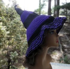 Awesome one of a kind purple and black witches' hat, great for your Halloween costume, to wear to festivals or to wear to your cosplay event.  Can be worn by men or women or would make a great gift for your favorite witchy friend. Crocheted with a double strand of black and purple acrylic yarn.   Hand wash with a mild detergent and lay flat to dry. 18" from brim to top point Fits most adults. Purple Witch Headpiece, Crochet Twisted Witches Hat Pattern Free, Witches Costume, Purple Witch Hat, Black Witches, Hat Cosplay, Purple Witch, Wizard Hat, Purple Acrylic