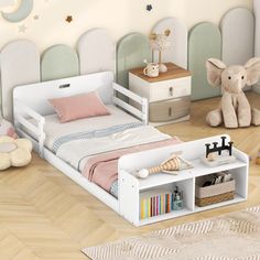 a child's bedroom with white furniture and wooden flooring, including a bed