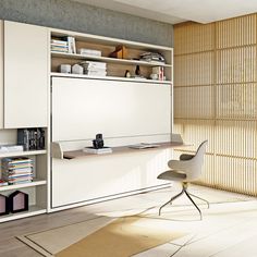 a room with a chair, desk and bookcases in the middle of it