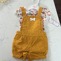 Nwt Size 12 Months 2 Pieces (Shorts And Shirt) Yellow/Orange Shorts With A Floral Shirt No Trades, Open To Reasonable Offers! Spring Playwear Short Set, Spring Short Set For Playwear, Cute Yellow Shorts For Playwear, Cute Yellow Shorts For Play, Spring Short Yellow Sets, Cute Yellow Shorts For Spring, Casual Short Yellow Set, Yellow Cotton Shorts For Playwear, Moschino Outfit