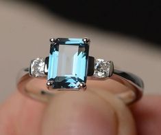 100% Natural Gemstone, London Blue Topaz 8x6 MM Octagon Cut Ring, 925 Sterling Silver ring, Engagement Ring, Weddings Ring, Handmade Jewellery Ring, Gift For Her, 𝐌𝐚𝐢𝐧 𝐒𝐭𝐨𝐧𝐞 𝐃𝐞𝐭𝐚𝐢𝐥𝐬  ↣ Stone Name    :- London Blue Topaz ↣ Stone Shape   :- Octagon Cut ↣ Stone Size       :-  8x6 MM  ↣  Secondary stone :- Zircon ↣ Material :- 925 Sterling Silver ❁❁ 𝐉𝐞𝐰𝐞𝐥𝐫𝐲 𝐂𝐞𝐫𝐭𝐢𝐟𝐢𝐜𝐚𝐭𝐞 ❁❁ ↣ KHJewels branded authenticate Jewellery Certificate comes with the authenticity of Metal, Moi Weddings Ring, Jewelry Certificate, Jewellery Ring, Handmade Jewelry Ring, Blue Topaz Stone, Tourmaline Ring, Ring Engagement, London Blue Topaz, London Blue