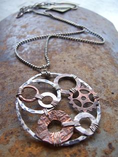 Organic Mixed Metals Steampunk Necklace - Industrial Evolution Collection - Steampunk Necklace - Steampunk Jewelry by dnajewelrydesigns on Etsy https://www.etsy.com/listing/90476726/organic-mixed-metals-steampunk-necklace Steampunk Metal Necklaces For Festivals, Steampunk Metal Necklace For Festivals, Handmade Steampunk Metal Necklace, Washer Jewelry, Hardware Jewelry, Steam Punk Jewelry, Bijoux Fil Aluminium, Industrial Jewelry, Jewerly Making