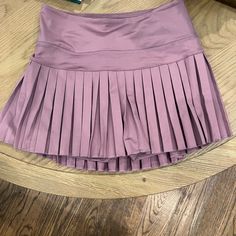 Gold Hinge Tennis Skirt - Color Plum, Pleated Tennis Skirt, Dual Side Hidden Pockets, Sweat Wicking Material, 15% Spandex, Gold Hinge Skirt, Pleated Tennis Skirt, Tennis Skirt, Color Purple, Hinges, Plum, Womens Skirt, Tennis, Spandex