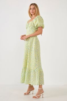 Get summertime fine with this floral print maxi dress. With a flattering back tie detail and puff sleeves, this dress is perfect for your next outdoor soiree. And no need to worry about the sun-this maxi dress comes lined so you can focus on enjoying your time in the sun. Floral print Maxi dress Puff sleeve Lined Hand wash cold Do not bleach Do not tumble dry Iron low Shell: 100% Polyester Lining: 80% Polyester 20% Cotton TL642D Total length: 53.50" Bust:33.50" S Height 5'9"/(175cm) / Bust 34"/( Outdoor Soiree, Tied Maxi Dress, Maxi Dress Designs, Cutout Maxi Dress, Short Sleeve Maxi Dresses, Floral Print Maxi Dress, Floral Print Maxi, Cotton Maxi, Maxi Dress Cotton