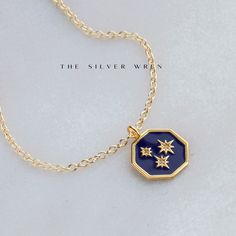 Since ancient times stars in the night sky have been a symbol of guidance and protection. This beautiful starry pendant necklace will be your favorite dainty jewelry! It's perfect for everyday or as a meaningful gift.•22mm navy enamel pendant made of 18kt gold over sterling silver.•Tiny CZ crystals grace the center of the stars.•14kt gold filled dainty link chain.LENGTH•Please select from the drop down selection.•The standard length is normally 18".•Model is wearing 18" in Photos. Model is weari Stars In The Night Sky, The Night Sky, Ancient Times, Dainty Jewelry, 14kt Gold, Night Sky, Meaningful Gifts, Link Chain, Chain Length