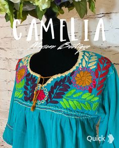 Mexican tunic with frontal neck embroidery on a soft and fresh gauze fabric. 3/4 inch sleeve has embroidery and tassel detail. Match it up with our comfortable embroidered espadrilles and embroidered tasseled clutch. SIZE CHART: td {border: 1px solid #ccc;}br {mso-data-placement:same-cell;} MEXICAN EMBROIDERED TUNIC FLOWERS WIDTH BUST LENGTH ONE SIZE 20" 40" 29" approximate measurements are in inches COLOR: Color options are based on embroidery design. CARE:• Cold wash, delicate, inside out. • H Bohemian Peasant Top With Multicolor Embroidered Neckline, Bohemian Tops With 3/4 Sleeve And Floral Embroidery, Bohemian Embroidered Peasant Tunic Top, Bohemian Embroidered Blouse With 3/4 Sleeves, Traditional Long Sleeve Tunic With Embroidered Hem, Bohemian Embroidered Long Sleeve Top With Tassels, Floral Embroidered Tunic Top For Festival, Green Bohemian Top With Floral Embroidery, Bohemian Green Top With Floral Embroidery