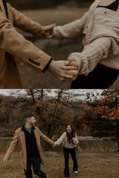 an engaged couple holding hands and walking through the woods in autumn or winter, with their arms around each other