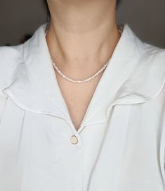 This Freshwater keshi seed pearl necklace, Layering pearl necklace, Tiny pearl necklace, Pearl necklace, Pearl choker, Chain pearl necklace looks so chic and modern. It is made with tiny freshwater keshi pearls (3.5-4mm) and 14k gold paperclip chain. The closure is a lobster claw closure. The length is 16.5 inches, so it sits right on your collar bones. It can be worn alone (see picture 6) or as a layering necklace (see picture 7). The original design does not include an extension chain, however Pearl White Beaded Necklaces With Clavicle Chain, Pearl Clavicle Chain Necklace With Round Beads, Everyday Delicate White Crystal Necklace, White Chain Necklace With Pearl Pendant And Round Beads, White Baroque Pearl Chain Necklace With Pearl Drop, Minimalist Everyday Pearl Choker Necklace, White Baroque Pearl Drop Chain Necklace, Dainty White Crystal Necklace With Delicate Chain, Pearl White Clavicle Chain Choker Necklace