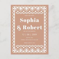 save the date card with an ornate frame in peach and white on a marble background