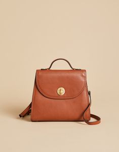 Saddle Brown Siren Vintage Satchel from Spartina 449 Spartina 449 Handbags, Vintage Satchel, Spartina 449, Debossed Logo, Leather Satchel Handbags, Saddle Brown, Longchamp Le Pliage Backpack, Leather Cleaning, Satchel Handbags