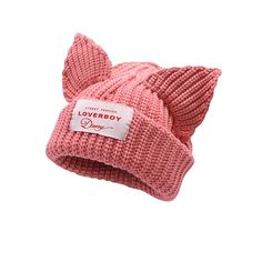 a pink knitted hat with a bow on the front and label that says loveboy