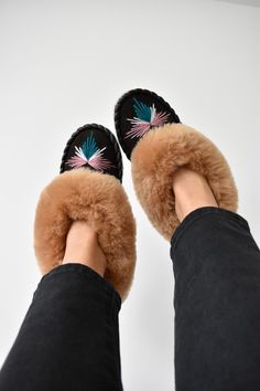 Beautiful, unique, traditional, 100% handmade sheepskin moccasins slippers are made from natural leather and sheep wool. Small leather pieces and sheepskin leftovers are turned into beautiful and one of a kind home shoes. Our slippers are very soft and comfortable. Perfect on rheumatic pain and are hypoallergenic. Outer: sheepskin; Sole: harden suede leather ( will soften after 2-3 days) Insole: wool lining Please note - because of handmade nature of this slippers colour shade, or thread might differ a liitle bit. Mocassin Slippers, Moccasin Slippers, Moccasins Slippers, Home Shoes, Leather Pieces, Sheep Wool, Color Shades, Natural Leather, Womens Slippers