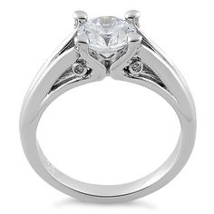 Top of ring height: 7.2mm

Top of ring width: 8mm

Band width: 3.2mm

Shank width: 2.8mm



Stone material: clear cubic zirconia

Center stone size: 7mm

Stone shape: round cut 

Center stone carat weight: 1.28ct

Total number of CZ stones: 1

Stone setting: prong setting



Metal: 925 sterling silver

Plating: rhodium plated

Finish: high polish Cubic Zirconia Diamond Ring With Center Stone, Cubic Zirconia Birthstone Ring With Prong Setting For Promise, Modern Birthstone Ring With Round Cut Center Stone, Promise Rings With Channel Set, Modern Round Cut Birthstone Ring With Center Stone, Cubic Zirconia Diamond Ring With Tension Setting For Promise, Modern Solitaire Cubic Zirconia Rings, Modern Cubic Zirconia Ring With Prong Setting, Cubic Zirconia Birthstone Ring For Proposal, Round Cut