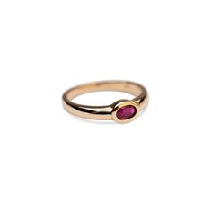 14k Gold Ruby Bezel Ring Our new stunning 14k Gold Ruby Bezeled Ring is beautiful ring that stands alone with its stunning deep red hues. Hand set by us, for you in our simple yet timeless 14k Bezel Ring. Band Width: 5.25mm tapering down to 3.25mm at the shank Bezel Size: 6mm x 4mm Built to last a lifetime and more. Due to the handmade nature of this ring, please allow 1 - 3 weeks for processing. Small Ruby Necklace, Red Engagement Rings, Ruby Ring Simple, Patty Smith, Red Engagement Ring, Jewelry Mood Board, Ruby Ring Vintage, Gold Moonstone Ring, Ring Inspo