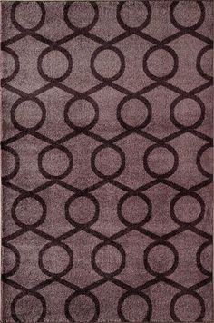 an area rug with circles on it in grey and black colors, including the center circle