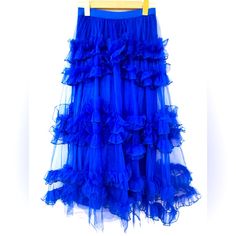 Indulge In The Dreamy Allure Of This Vibrant Blue Tulle Skirt. Crafted With Layers Of Soft And Airy Tulle, It Embodies A Sense Of Charm. The Rich Blue Hue Adds A Pop Of Color To Your Ensemble, While The Comfortable Elastic Waistband Ensures A Flattering Fit. Whether It's A Casual Day Out Or A Special Event, This Tulle Skirt Is Your Ticket To Effortless Elegance. Blue Tulle Skirt, Long Tulle Skirt, Denim Skirts Knee Length, Brown Leather Skirt, Tulle Long Skirt, Festival Skirts, Fashion Skirts, Lace Midi Skirt, Striped Midi Skirt