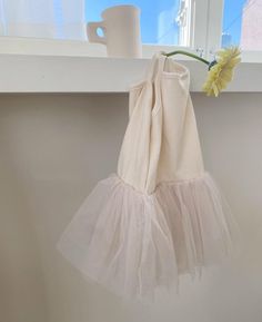 Ribbed sleeveless with tulle skirt Composition - Cotton 100% Care -Machine wash cold with like colors -Tumble dry low Made in Korea Summer Ballet Tutu Dress For Dress-up, Spring Sleeveless Tulle Tutu Dress, Cute Sleeveless Tulle Tutu Dress, Spring Balletcore Tutu Dress With Ruffles, Spring Balletcore Tulle Tutu Dress, Cute Sleeveless Tutu Dress With Tulle Skirt, White Sleeveless Tutu Dress For Summer, Summer Tulle Dress Balletcore Style, Summer Tulle Dress In Balletcore Style