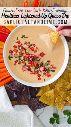 Dipping a tortilla chip in healthy queso dip. Healthy Queso Dip, Healthy Queso, Enchiladas Burritos, Low Calorie Low Carb, Vegetable Dips, Queso Dip Recipes, Keto Gluten Free, Delicious Dips, Queso Recipe