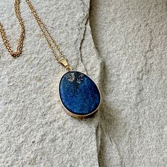 Lapis Lazuli Pendant Necklace, Gold Blue Drop Pendant, September Birthstone, Lapis Lazuli Jewelry, Gift for Her, Blue Gemstone Necklace This listing is for one necklace -  Natural Lapis Lazuli pendant  -  Gold-plated Chain Necklace Size of the pendant: about 20mm wide, 35mm long                                              LAPIS LAZULI: Keywords:  Truth, Inner Power, Organization LAPIS LAZULI  is a stone of communication that can bring truthfulness, openness, and mental clarity. It is used to he Blue Gemstone Oval Pendant Jewelry, Blue Spiritual Birthstone Jewelry, Oval Blue Birthstone Gemstone, Elegant Blue Lapis Lazuli Crystal Necklaces, Oval Pendant Lapis Lazuli Jewelry Gift, Elegant Blue Lapis Lazuli Crystal Necklace, Blue Oval Gemstone Necklace, Blue Oval Birthstone Necklaces, Blue Oval Birthstone Necklace