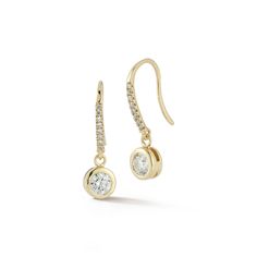 14kt Round Diamond Drop Earrings The Diamanté Collection takes its inspiration from Mateo's recent visit to the De Beers Orapa Diamond Mine in Botswana. Mother Nature has done a fantastic job creating these magnificent diamonds. Our only duty was to simply highlight each stone for daily wear. A brilliant round diamond is beautifully bezel set in solid gold and hangs from pave ear wire. 14kt Yellow Gold 1.37gm Gold 0.620ct Diamonds Ear Wire Made in New York City Luxury Pave Set Diamond Dangle Earrings, Luxury Diamond Dangle Earrings With Pave Setting, Elegant Yellow Gold Halo Earrings, Luxury Diamond Earrings With Pave Setting Round Cut, Luxury Diamond Earrings With Pave Setting In Round Cut, Luxury Round Cut Diamond Earrings With Pave Setting, Elegant Yellow Gold Diamond Earrings With Single Cut Diamonds, Refined 14k Gold Earrings For Anniversary, Elegant Dangle Diamond Earrings With Pave Setting