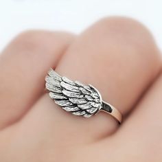 925 Sterling Silver Angel Wing Ring Metal:925 Sterling Silver Height:7 mm >Nickel Free >Tarnish Resistant >No Allergic reaction >30 days return policy ++Items come in a gift box ready to be gifted Please contact me if you have any questions about the jewelry you are interested in buying. My Shop: https://www.etsy.com/shop/banujewelryusa Follow BANU Jewelry on Facebook, Instagram and other social media sites to keep up to date with newest products. www.instagram.com/shopbanujewelry ww Angel Rings, Elegant Sterling Silver Winged Rings, Gold Sterling Silver Jewelry With Angel Wings, Silver Angel Wings Jewelry Gift, Sterling Silver Angel Wing Ring, Wing Angel, Wing Ring, Angel Wing Ring, Angel Ring