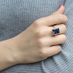 Solitaire Blue Sapphire Ring - Etsy New Zealand Blue Sapphire Ring With Rectangular Stone, Sapphire Crystal Ring Birthstone Fine Jewelry, Elegant Blue Crystal Ring With Gemstone Accents, Elegant Blue Birthstone Ring With Gemstone Accents, Modern Blue Gemstone Jewelry, Modern Sapphire Rings With Prong Setting, Elegant Sapphire Crystal Ring Birthstone, Blue Rectangular Stone Ring Fine Jewelry, Blue Rectangular Stone Ring In Fine Jewelry Style