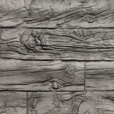 an old wood paneled wall is shown in this black and white photo, with the texture