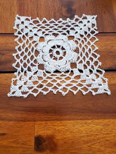 A handmade, crocheted, white doily, great for decoration anywhere in your home. - Hand washable - 7 inch by 7 inch square Hi! My name is Anastasia. My mother taught me to crochet, and I want to do my part to keep the art form alive and share it with others. Simple as that. All pattern credit goes to Annie's Crochet 101 Doilies. My Mother Taught Me, Annie's Crochet, Crochet 101, White Rock, Cotton Thread, Dining Linens, Doilies, Art Forms, Table Linens