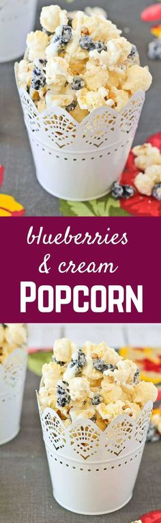 blueberries and cream popcorn in white paper cups