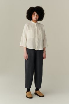 "This garment is oversized. Before placing an order, check the approximate measurements of the finished garment given below. FREE CUSTOMIZATION Important: We can make the garment longer by adding 15cm | 6″ free of charge Possible changes: Lengthen | shorten the garment Lengthen | shorten the sleeves Change the color to one that is not listed but is available on the color palette. The above alterations make the item non-returnable and non-refundable. The model is 5'11\" (180cm) tall with a 94cm/37\" bust, 72cm/28.3\" waist, 99cm/39\" hips and she is wearing an XS. XS Length ± 65cm | 25.6\" Bust ± 135cm | 53.1\" Sleeve length from HPS ± 60.5cm | 23.8\" Sleeve width ± 42cm | 16.5\" Hem width ± 135cm | 53.1\" S-M Length ± 66cm | 26\" Bust ± 143cm | 56.3\" Sleeve length from HPS ± 62cm | 24.4\" Classic Oversized Linen Tops, Oversized Linen Blouse With Pockets, Oversized Linen White Blouse, Classic Oversized Linen Blouse, White Linen Blouse With Button Cuffs, Relaxed Fit Linen Blouse With Button Cuffs, Effortless Linen Blouse, Oversized Effortless Linen Blouse, Relaxed White Linen Blouse