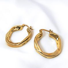 Hoop Earrings These earrings are crafted from high-quality stainless steel and plated with 24K gold, offering both durability and elegance.  The waterproof feature means you can wear them without worrying about damage from moisture. Metal: Stainless Steel 24k Gold Plated Cubic Zirconia Length: 3.1cm / 1.22inch Weight: 18g Waterproof & Sweatproof Hypoallergenic, Nickel-free & Lead-free Stainless Steel Yellow Gold Hoop Earrings Gift, Hypoallergenic Gold Stainless Steel Hoop Earrings, Gold Stainless Steel Tarnish Resistant Huggie Earrings, Gold Stainless Steel Small Huggie Earrings, Gold Small Hoop Huggie Earrings, Small Gold Stainless Steel Huggie Earrings, Tarnish Resistant Small Hoop Huggie Earrings In Stainless Steel, Tarnish Resistant Stainless Steel Small Hoop Huggie Earrings, Stainless Steel Tarnish Resistant Huggie Earrings For Gifts