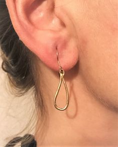 This beautiful 14 Karat Yellow Gold Handmade Tear Drop Earring is all handmade by Carolyn. It features artifact like looks both sides differ from each other. Unique design for stylish women. Total weight of 14K gold is 1.5 grams. Pair of earring Dimensions 25x10mm Can be ordered in rose or white gold. Due to the nature of hadmade products and computer screens, actual product may slightly differ from the one featured in the picture. Handmade 14k Gold Earrings For Everyday, Hypoallergenic Yellow Gold Teardrop Jewelry, Hypoallergenic Gold Pear-shaped Earrings, 14k Gold Filled Elegant Teardrop Earrings, Yellow Gold Dangle Teardrop Earrings For Everyday, Elegant 14k Gold-filled Teardrop Earrings, Delicate 14k Gold Teardrop Earrings, Everyday Yellow Gold Dangle Teardrop Earrings, Gold Hypoallergenic Teardrop Earrings In Sterling Silver