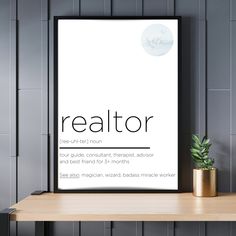 a poster with the words realtor on it next to a potted plant in front of a gray wall