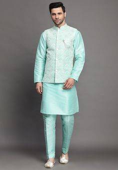 Art Silk Kurta in Sky BlueThis Readymade attire is Enhanced with Buttons, Thread and Sequins Work. Crafted in Chinese Collar Neck and Full SleeveAvailable with an Art Silk Pant in Sky Blue and an Art Silk Nehru Jacket in Sea GreenDo note: Brooch and Footwear shown in the image is for presentation purposes only. Half to one inch may vary in measurement. (Slight variation in actual color vs. image is possible) We sell all kinds of menswear. Mens Kurta | Mens Kurta Pajama | Mens Sherwani | Mens She Green Embroidered Winter Sets, Blue Nehru Jacket With Long Sleeves For Winter, Blue Long Sleeve Nehru Jacket For Winter, Blue Nehru Jacket With Stand Collar For Winter, Blue Winter Nehru Jacket With Stand Collar, Fitted Blue Embroidered Nehru Jacket, Blue Long Sleeve Nehru Jacket For Festivals, Blue Long Sleeve Outerwear With Intricate Embroidery, Blue Long Sleeve Bandhgala For Spring