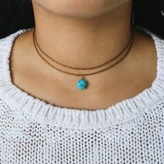 🌟 Unique raw turquoise pendant in gold and silver on a cotton ribbon - handmade for you and your loved ones! #RawTurquoise #Choker #handmade #natural jewelry #birthstone Discover the natural beauty and positive energy of our hand-wound raw turquoise choker in the color of your choice! Each piece is unique, carefully crafted to offer you a one-of-a-kind piece of jewelry. 🌿PRODUCT HIGHLIGHTS: ・Raw turquoise pendant (stone size: 8-10mm) hand-wrapped in precious gold or silver. ・Wire of the pendant is gold filled or sterling silver 925 for longevity. (waterproof!) ・Natural and high-quality waxed cotton ribbon with sliding bead clasp ・Hand-picked stones for the highest quality and elegance. ・Simple one- or two-layer technique to adjust to your personal desired length ・Unique pattern and color Spiritual Turquoise Jewelry With Adjustable Cord, Dainty Turquoise Adjustable Choker, Turquoise Choker Necklace As A Gift, Turquoise Jewelry With Adjustable Cord As Gift, Adjustable Turquoise Dainty Choker, Spiritual Adjustable Turquoise Necklace Gift, Handmade Dainty Adjustable Turquoise Necklace, Handmade Turquoise Choker As Gift, Choker Handmade