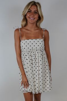 Unleash your inner fashionista with our Vera Dot Mini Dress! This playful and sheer dress features delicate tie shoulder straps and a fun polka dot pattern. Perfect for any occasion, this dress will have you feeling stylish and confident. (Warning: may induce envy in others.) Size + Fit Riley is 5’7” and wearing a size Small Content + Care 100% Polyester Lining: 100% Cotton Hand Wash Cold Color Separate Black And White Polka Dot Dress, Halloween Fashion Outfits, Gameday Fits, Senior Sunday, Polka Dot Mini Dress, Bday List, Church Fits, Clothing Wishlist