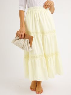 A refined take on a bohemian classic. A charming tiered skirt with pale yellow lace and elastic waist create a feminine feel for summer. Fit: Runs True To Size Fabric Content: 100% CottonFabric Care: Machine Wash Cold Gentle Cycle, lay flat to dryMeasurements: 34" LongLining: Yes, 100% PolyesterZipper: No S:0-2 M:4-6 L:8-10 Yellow Lace, Tier Skirt, Pale Yellow, Tiered Skirt, Lay Flat, Lace Skirt, Final Sale, Midi Skirt, Elastic Waist