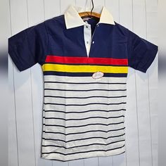 Perfect Condition Vintage Polo Shirt Kids Size 14 B3 Blue Polo T-shirt With Striped Collar, Casual Blue T-shirt With Striped Collar, Casual Blue Shirt With Contrast Stripes, Blue Casual Polo Shirt For School, Casual Blue Polo Shirt For School, Blue Casual School Polo Shirt, Casual Blue Color Block Shirt, White Color Block Collared Tops, Cotton Color Block Collared Top