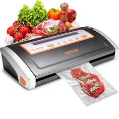 an image of a food vacuumer with fresh meat in the bag and vegetables on it