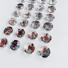 a collection of personalized glass magnets on a white surface with one photo in the middle