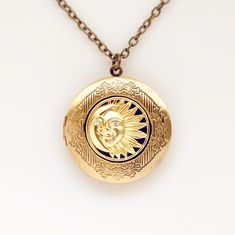 "Sun and Moon Locket Necklace Celestial Jewelry Photo Locket Gift for Women -I make this necklace using a matte gold sun and moon medallion with sparkly little rhinestone eyes and antique brass locket and chain -Locket measures 1 1/4\" across when shut -Holds for two photos -Nickel free, lead free alloy metal -Select your chain length in the drop down or pick \"custom\" and leave your desired length in the 'note to seller' at checkout -Gift Boxed More of my Lockets: https://www.etsy.com/shop/lyd Antique Gold Moon Jewelry, Vintage Sun And Moon Round Pendant Jewelry, Vintage Brass Jewelry With Sun And Moon Design, Vintage Sun And Moon Design Round Pendant Jewelry, Vintage Sun And Moon Round Necklace, Vintage Sun And Moon Round Necklaces, Moon Locket, Chain Locket, Rhinestone Eyes