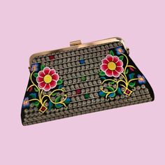 Beautiful Mexican embroidered floral design clutch with cotton strap. Two pockets inside and comes with black removable strap. Embroidered Multicolor Clutch For Evening, Embroidered Evening Bag For Summer, Spring Evening Bag With Detachable Strap, Black Bags With Floral Embroidery For Spring, Spring Evening Clutch With Detachable Strap, Summer Embroidered Pouch Clutch, Chic Embroidered Handheld Shoulder Bag, Embroidered Multicolor Handheld Evening Bag, Multicolor Embroidered Handheld Evening Bag