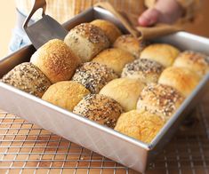 a pan filled with different types of bread