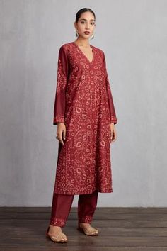 Garnet red long kurta with all-over aari work embroidered motifs. Comes with handwoven chanderi pants.
Component: 2
Embroidered
Neckline: V Neck
Sleeve Length: Long
Fabric: Handwoven Chanderi and Cotton Voile
Color: Red
Side slits - Aza Fashions Red Kurta, Cotton Voile Fabric, Clothing Guide, Cotton Kurti Designs, Garnet Red, Red Embroidery, Cotton Kurti, Embroidered Neckline, Indian Fashion Designers