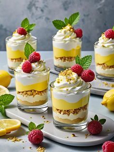 small desserts with lemon and raspberries on plates