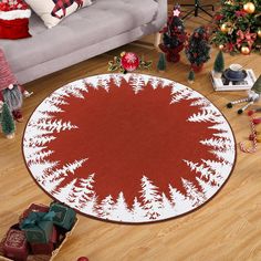 a red and white christmas tree rug in a living room with presents on the floor