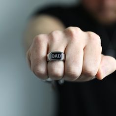 This ring is forged with high quality stainless steel and looks amazing on any guys hand. Don't know your ring size? Go here: etsy.com/listing/769243955/finger-ring-sizer-by-modern-out US Sizes 9, 10, 11, 12 12mm thick Made of stainless steel ► For longer lasting quality, please keep jewelry dry and away from chemicals. Jewelry care instructions come with every order. ► International orders are subject to tax/duty fees. This is uncontrollable on our end. Shipping can take up to 6 weeks due to cu Dad Ring, Mens Stainless Steel Rings, Jewelry Care Instructions, Unisex Necklace, Stainless Steel Ring, Mens Silver Rings, Bar Pendant, Men's Jewelry Rings, Mens Band