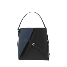 Marni calfskin leather hobo bag with a trapeze silhouette Top handle Adjustable shoulder strap Exterior, decorative buckled straps Interior, single compartment Lining: Suede leather Approx. 13"H x 12.5"W x 4.7"D Made in Italy Modern Shoulder Bag With Leather Handles In Calf Leather, Modern Shoulder Bag With Calf Leather And Leather Handles, Modern Calf Leather Shoulder Bag With Leather Handles, Designer Hobo Bag With Leather Handles For Office, Leather Hobo Bag With Detachable Handle For Work, Designer Office Hobo Bag With Leather Handles, Modern Bucket Satchel For Office, Square Evening Bucket Bag, Modern Square Bucket Bag