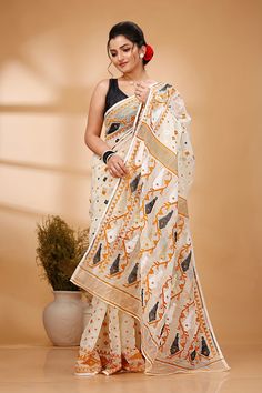 This Handloom Jamdani sarees is very classy. This is Low light weight, easy to drape, and very elegant. The saree is made up of organic linen that gives this saree a glossy look and is good as partywear. All Over Handloom Cotton Reshom Jamdni Saree Product details: jamdani's work is done on Cotton Reshom Jamdani Saree Type: All Over Handloom Cotton Reshom Jamdani Saree Saree Length: 5.5 meters Blouse Piece : No Saree Fabric: All Over Handloom Cotton Reshom Jamdani Saree Color: As shown in the pi White Handloom Pre-draped Saree, White Cotton Silk Handloom Pre-draped Saree, White Handloom Pre-draped Saree For Diwali, Unstitched Handloom White Pre-draped Saree, White Bollywood Style Handloom Pre-draped Saree, White Handloom Saree, White Self Design Chanderi Saree, White Chanderi Saree With Self Design, Semi-stitched Handloom White Saree