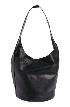 A sloped topline adds an asymmetric edge to this modern bucket bag that's made from leather in a slouchy silhouette that's structured enough not to topple over. Magnetic closure Shoulder strap Interior zip pocket Softly structured silhouette with flat base for stability Leather lining Leather Imported Adjustable Bag, Black Sparkle, Leather Bucket Bag, Leather Bucket, Medium Bags, Magnetic Closure, Bucket Bag, Zip Pockets, Shoulder Strap